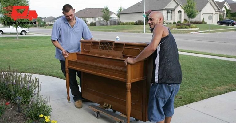 How to Move a Piano Safely — What Perth Homeowners Need to Know 2 Professional piano removalist securing an upright piano onto a piano board in Perth